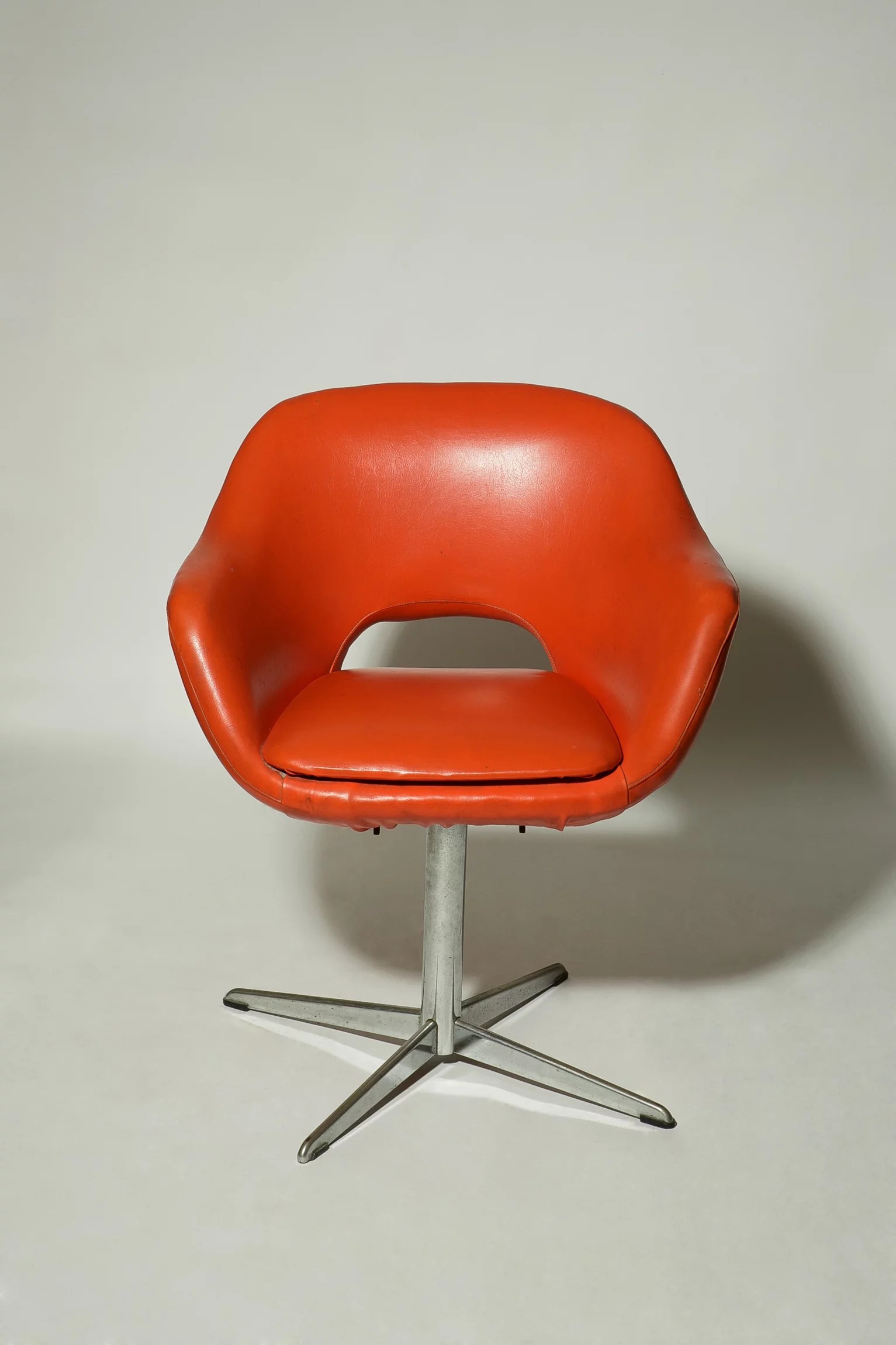 1970s orange vinyl chrome base armchair