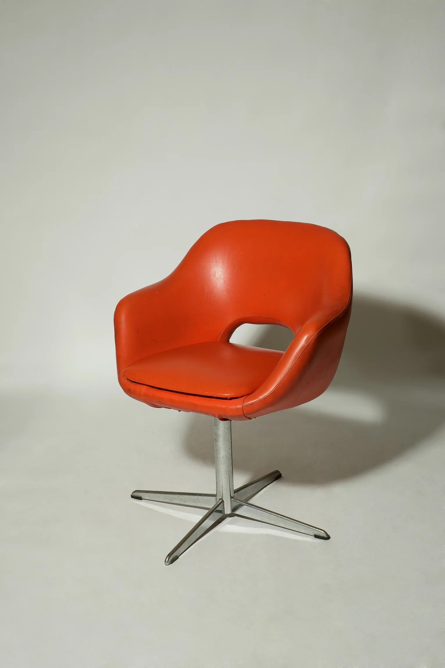 1970s orange vinyl chrome base armchair