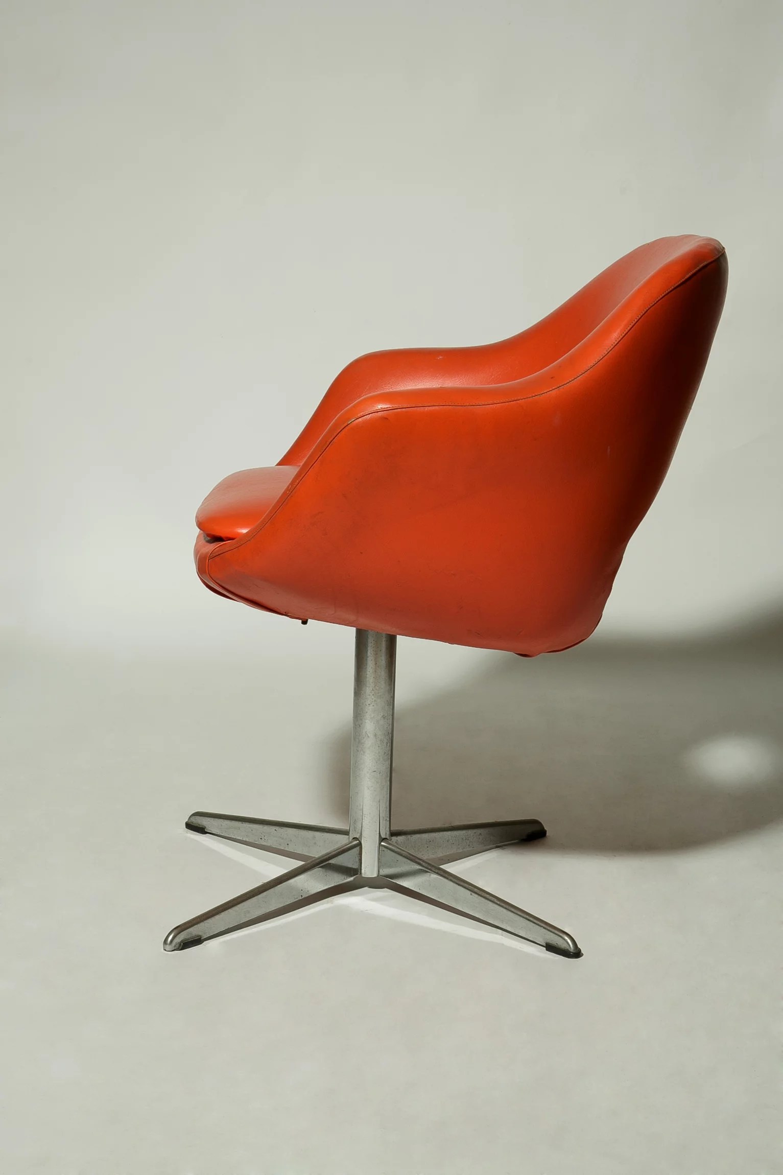 1970s orange vinyl chrome base armchair