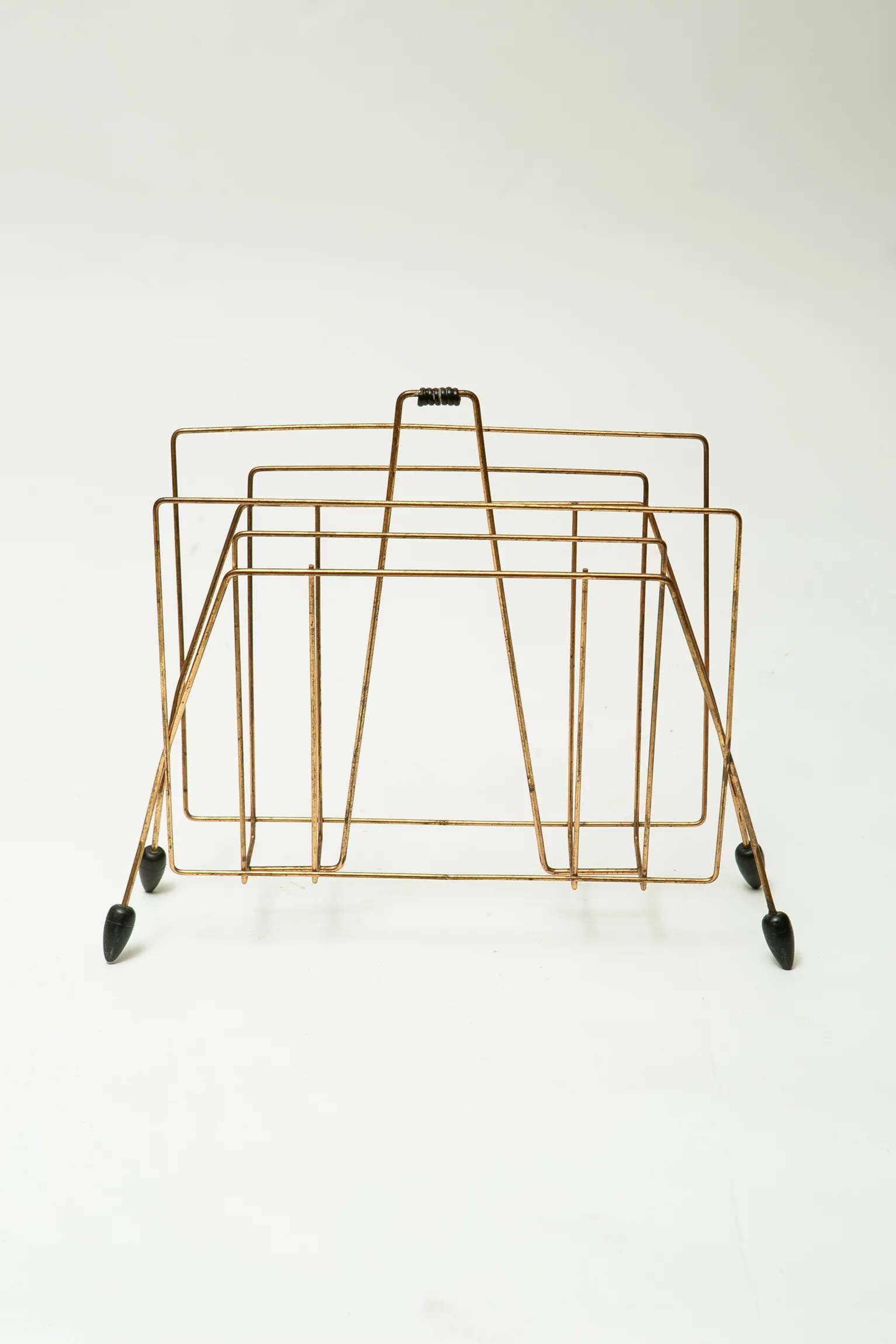 1960s ‘atomic’ copper magazine rack