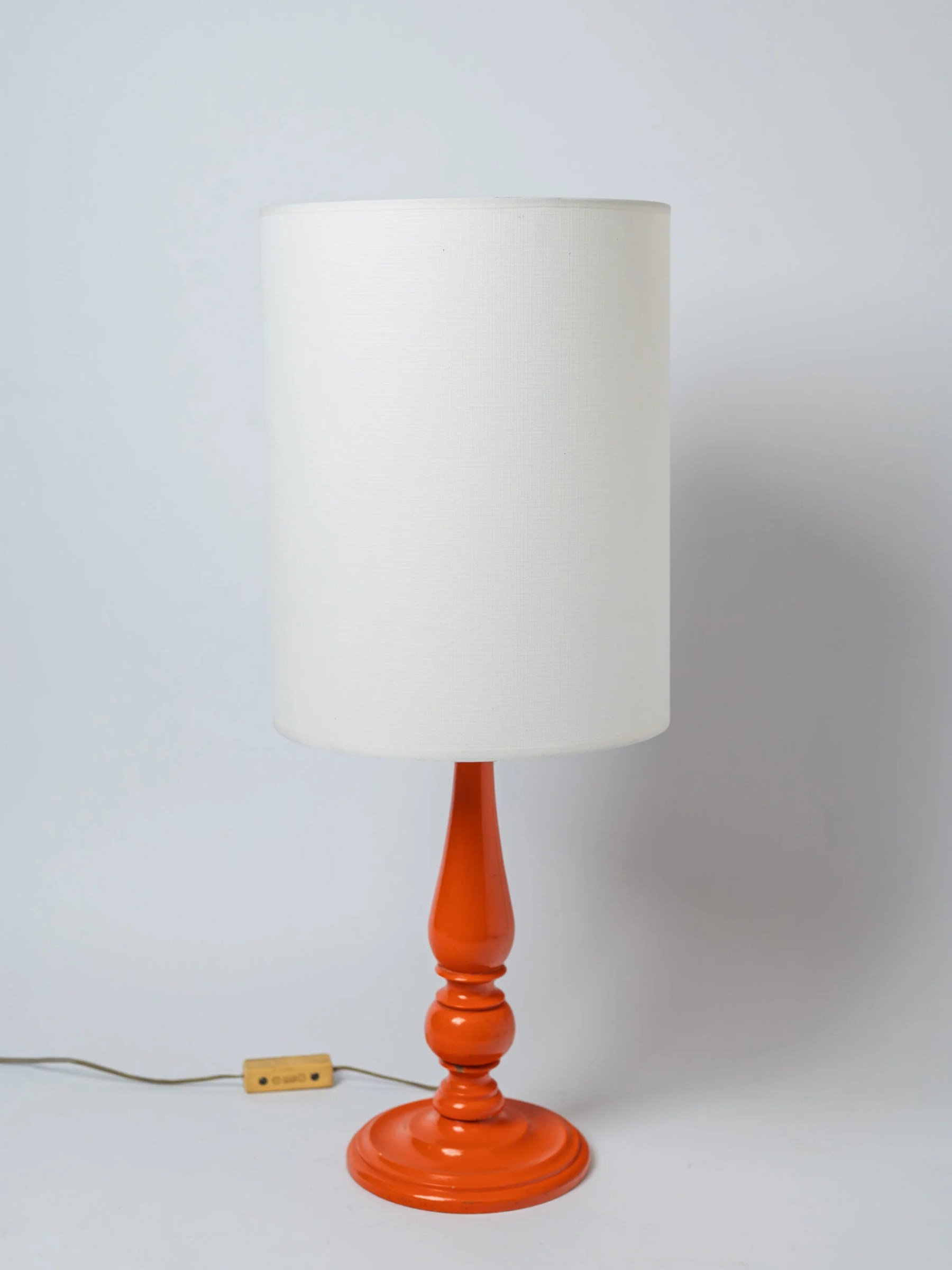 1970s MCM painted wood orange table lamp