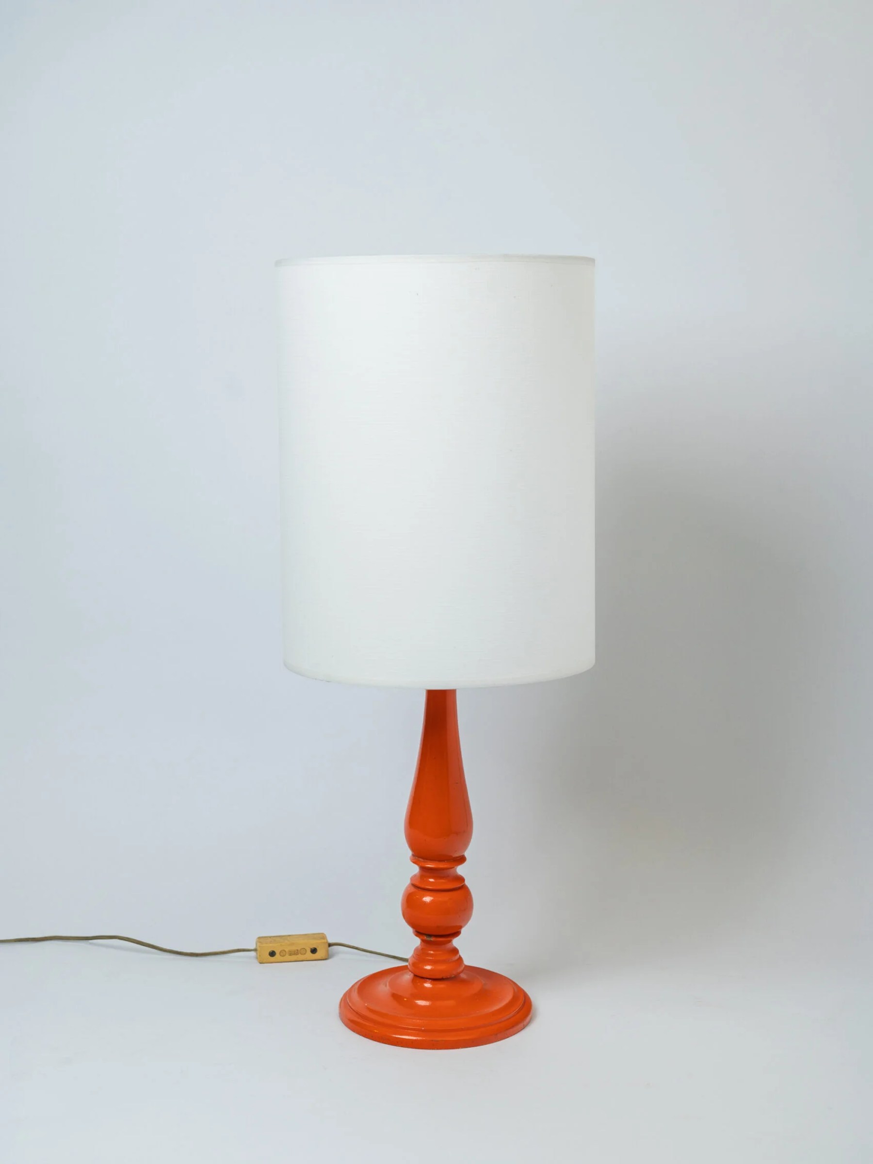 1970s MCM painted wood orange table lamp