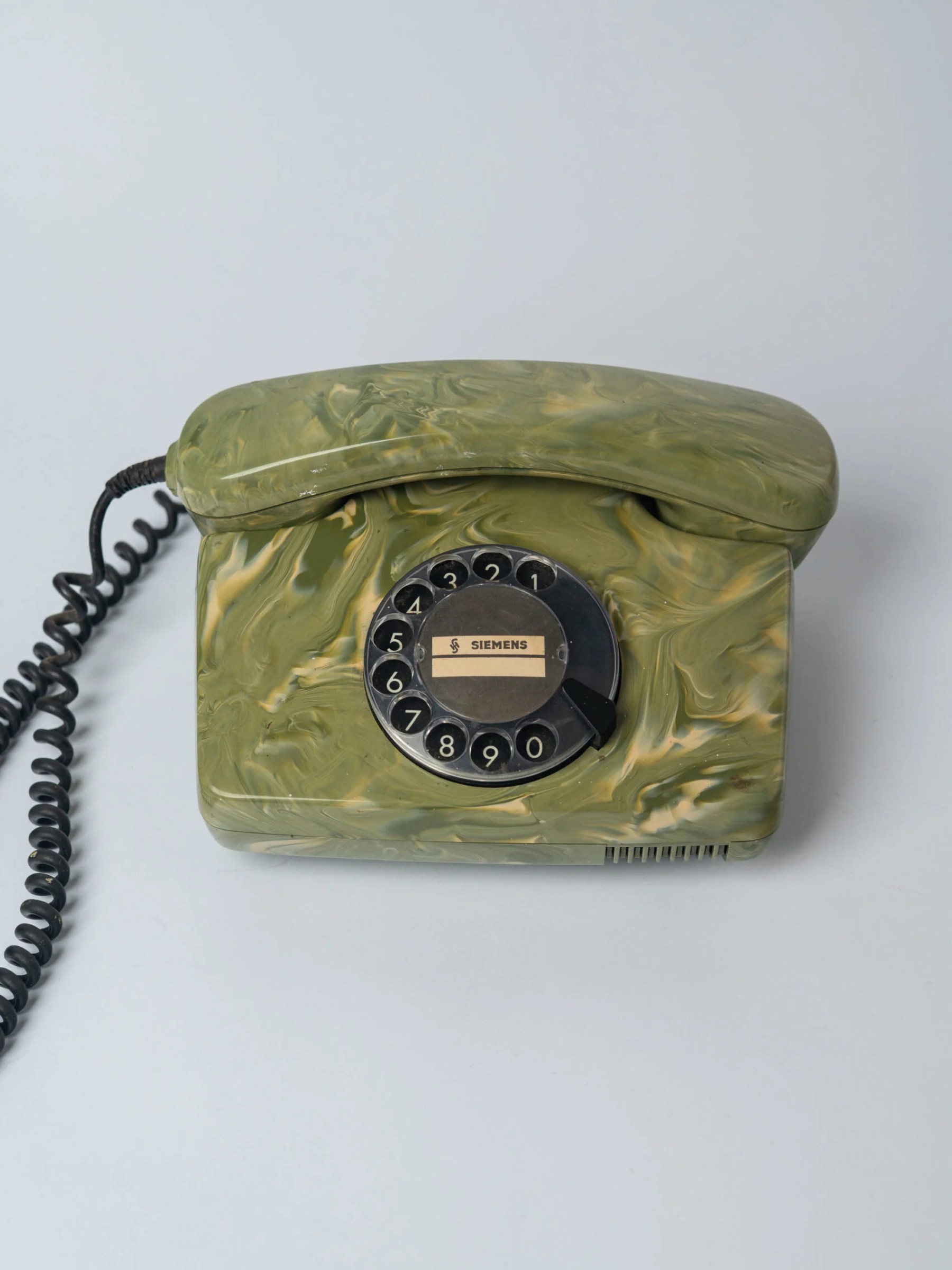 1970s Mid-Century Modern ‘Siemens’ green marble effect plastic rotary telephone