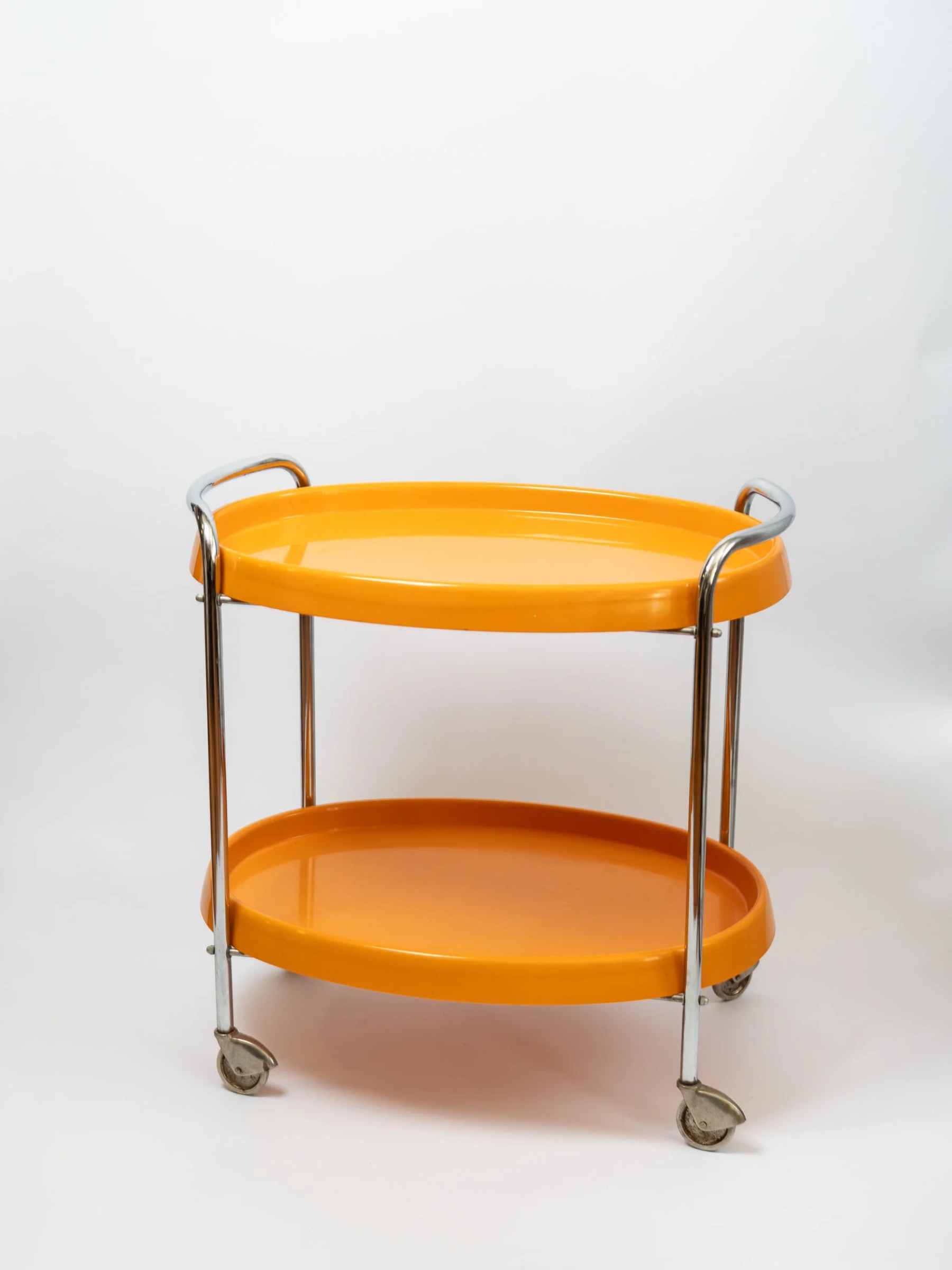 1970s space age MCM orange plastic & chrome drinks trolley