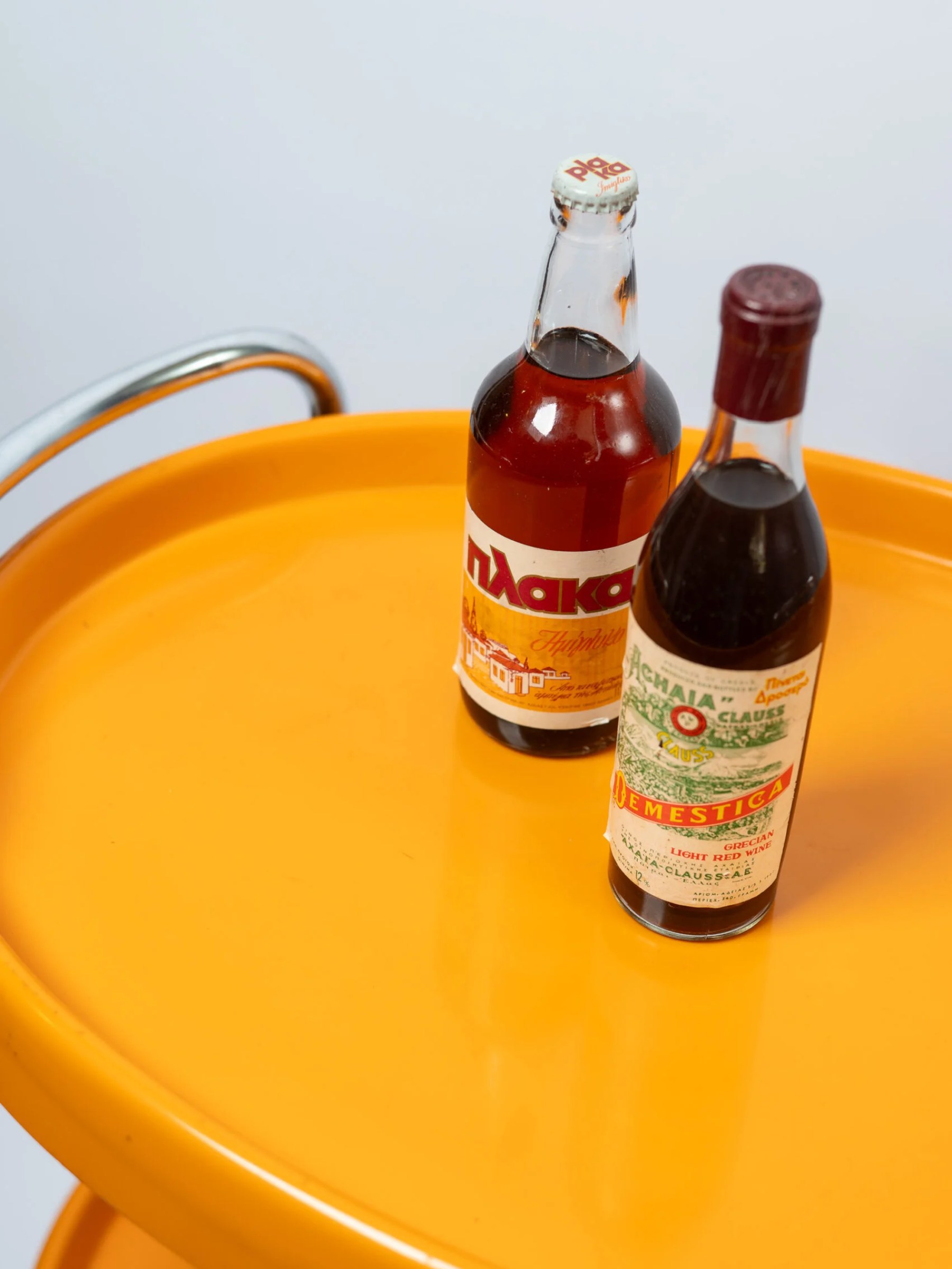 1970s space age MCM orange plastic & chrome drinks trolley