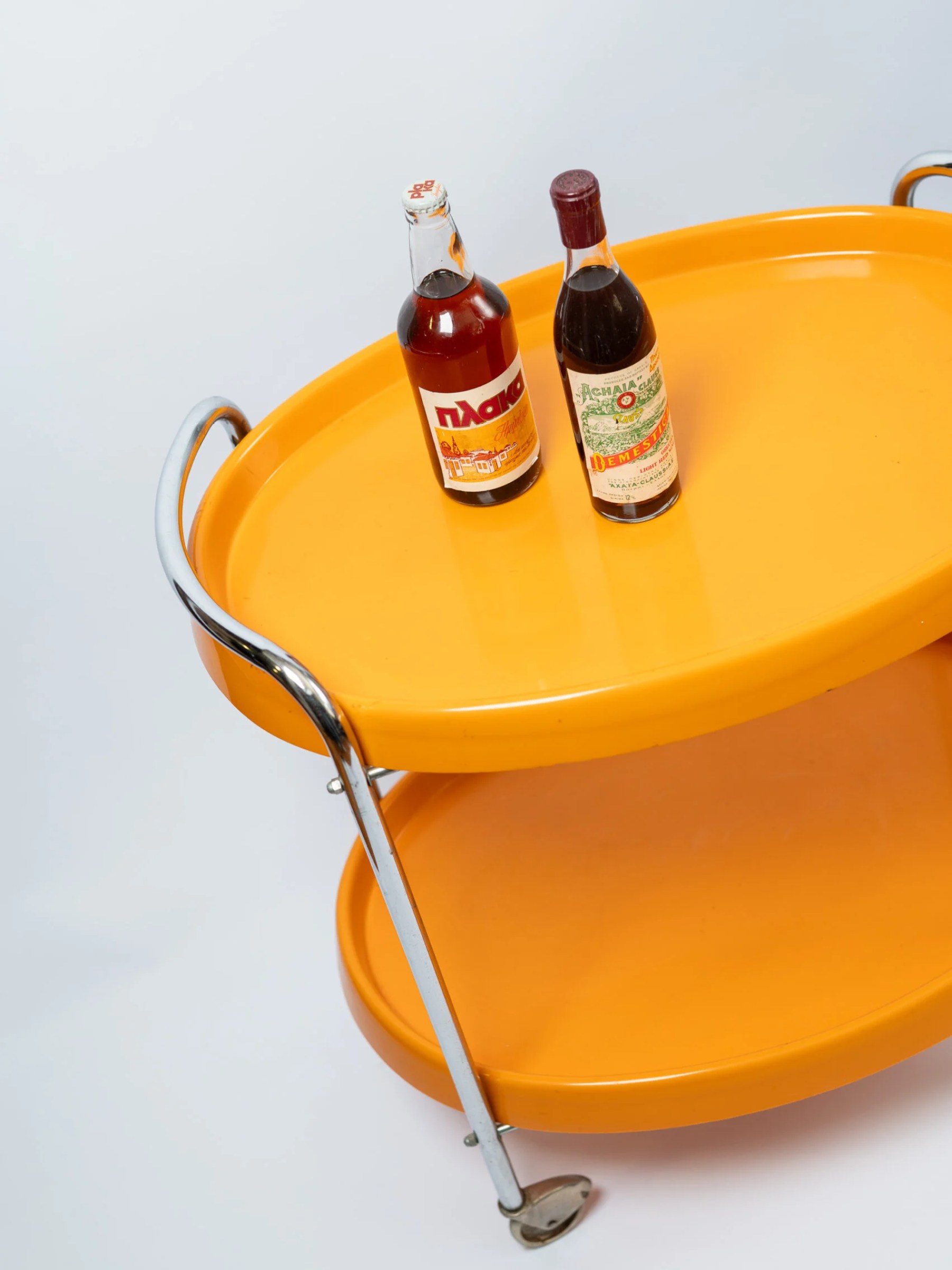 1970s space age MCM orange plastic & chrome drinks trolley