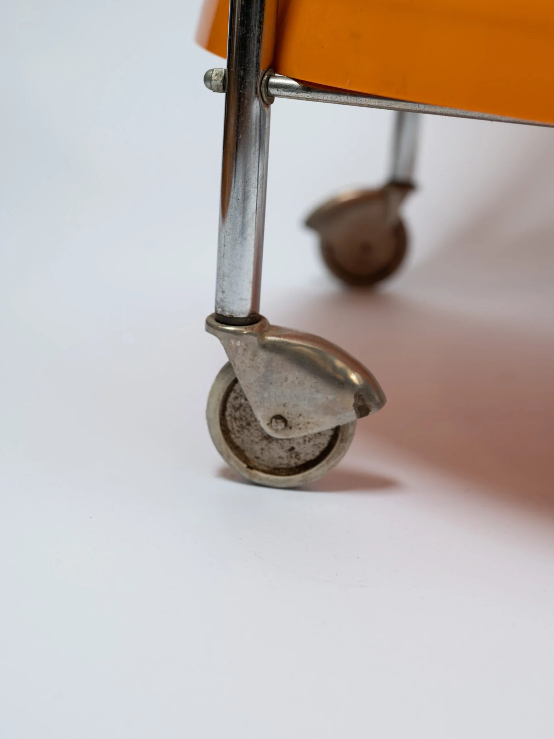 1970s space age MCM orange plastic & chrome drinks trolley