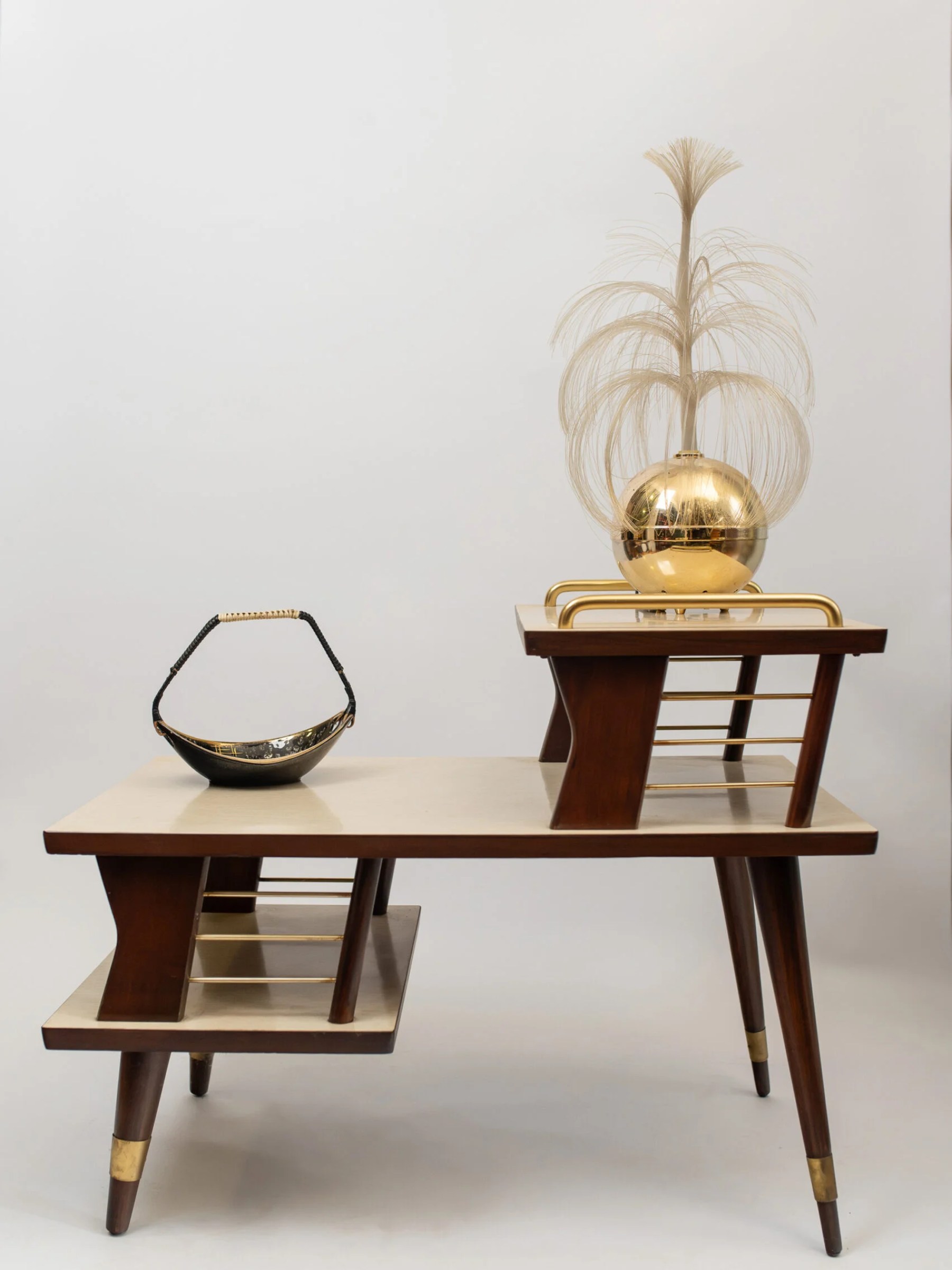 1950s MCM atomic three-tier end table in sleek sculptural form