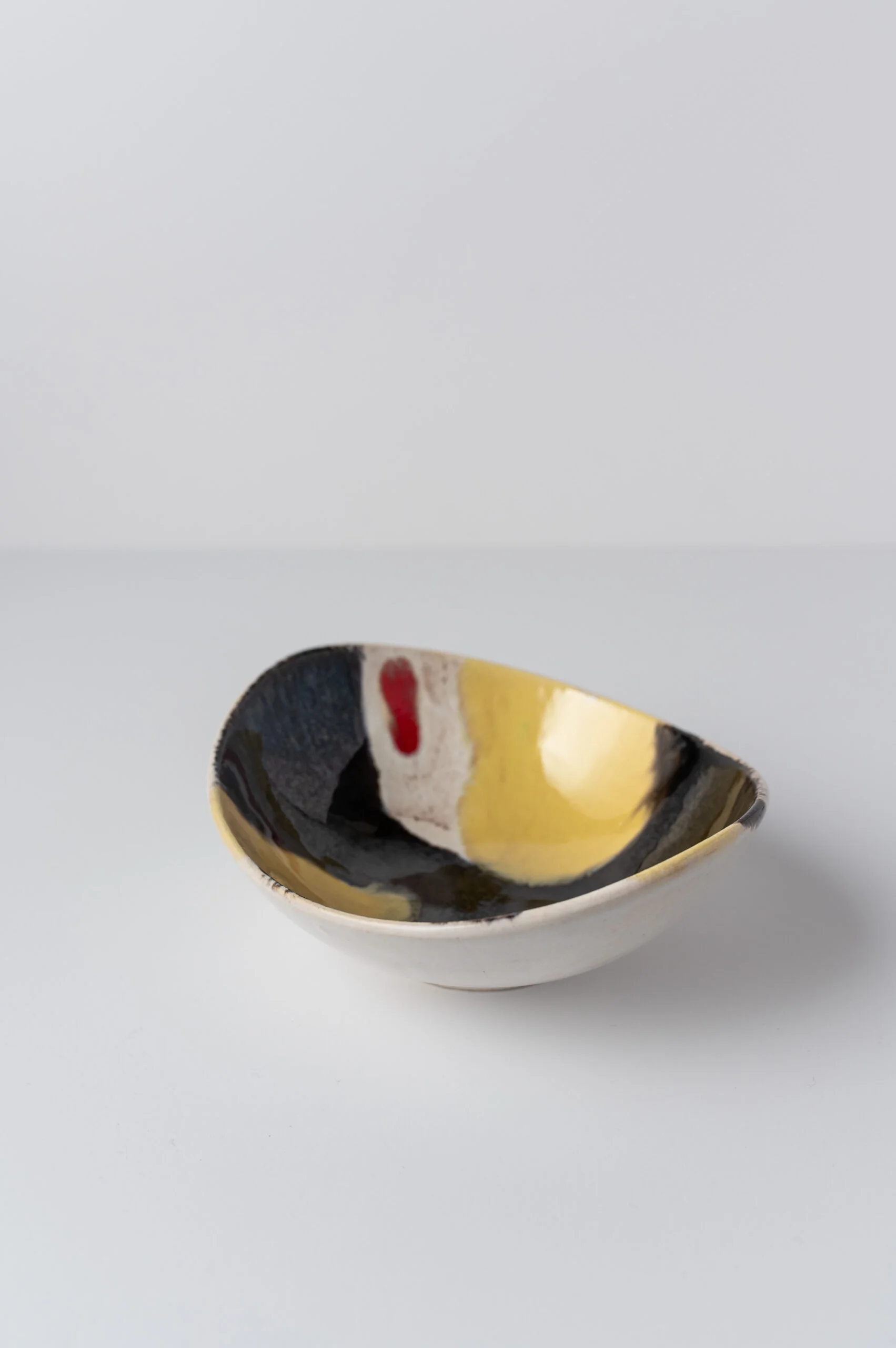 1950s German ‘Atomic’ MCM oval yellow & black glazed ceramic dish