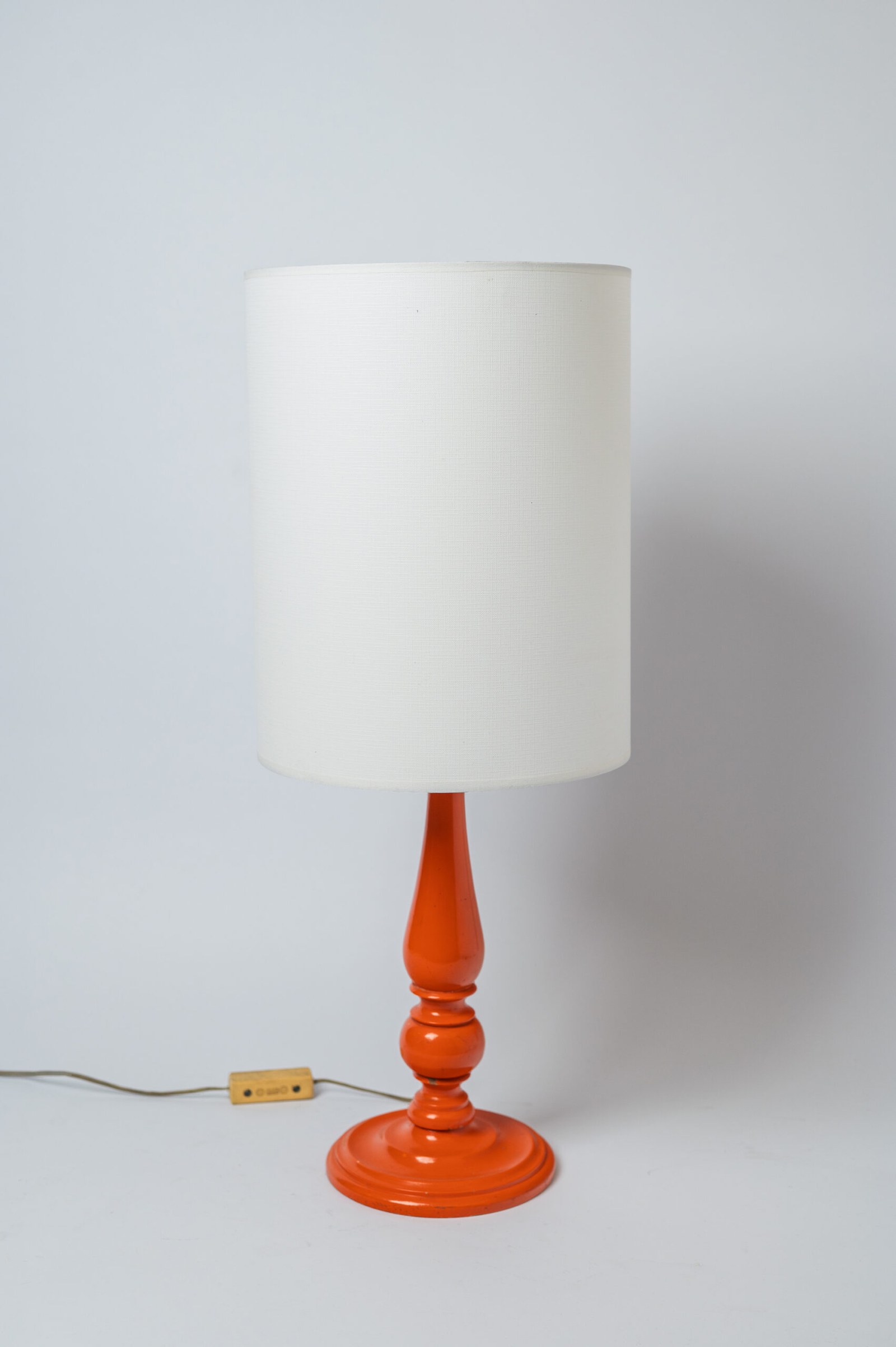 1970s MCM painted wood orange table lamp