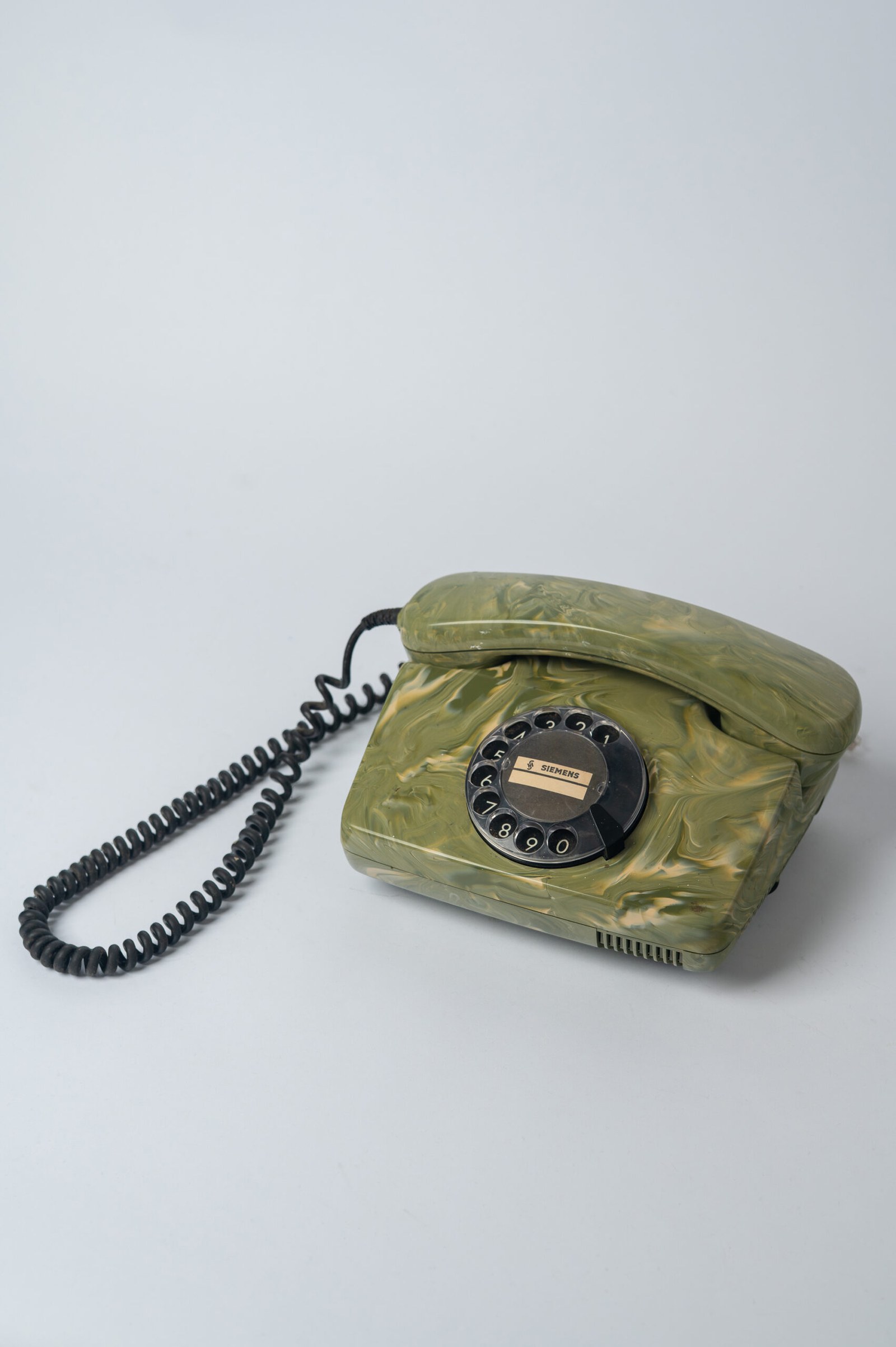 1970s Mid-Century Modern ‘Siemens’ green marble effect plastic rotary telephone