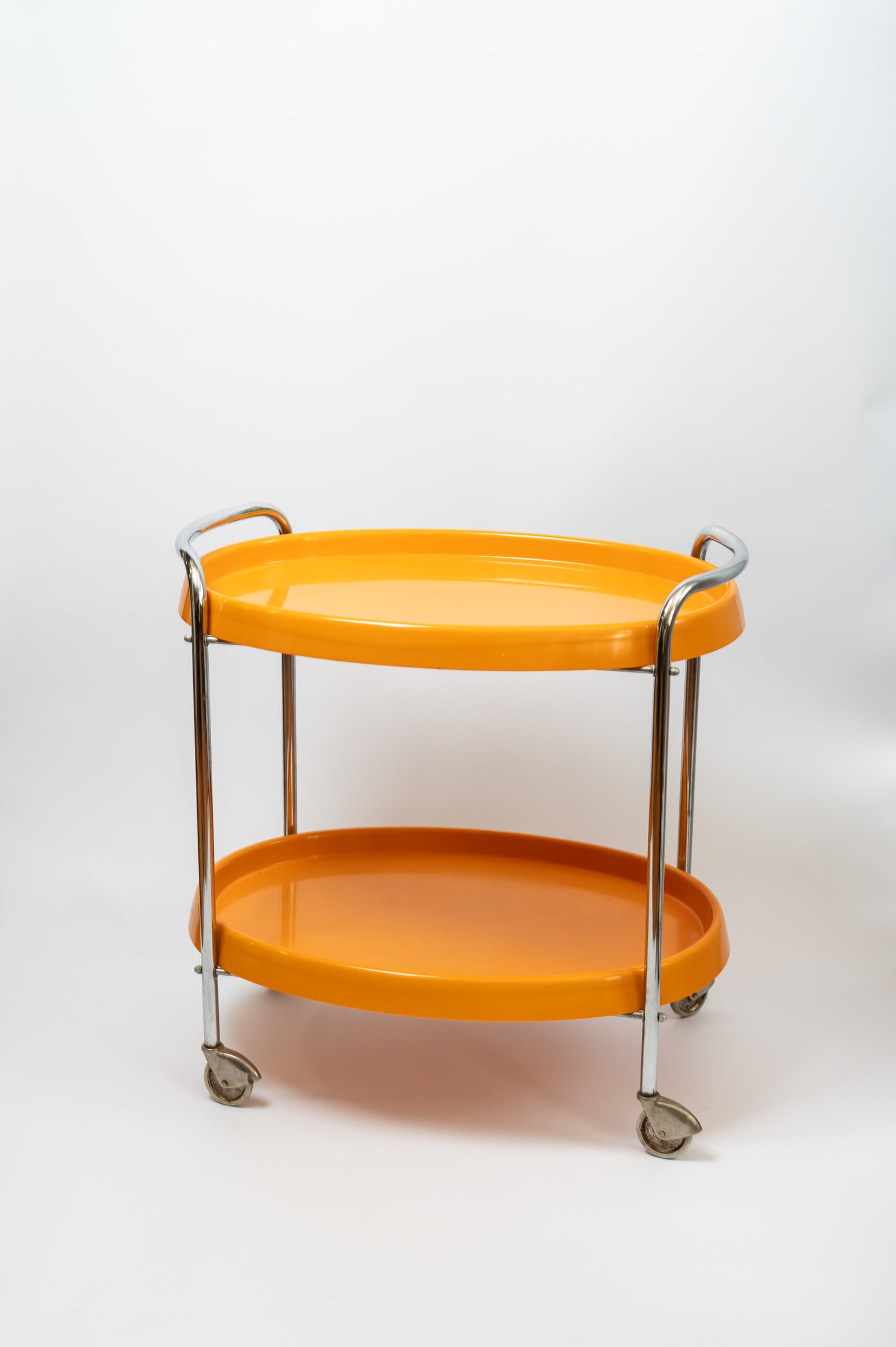 1970s space age MCM orange plastic & chrome drinks trolley