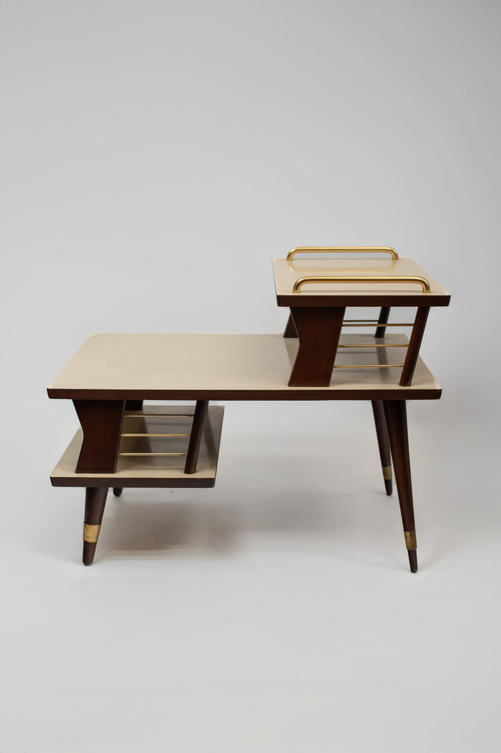 1950s MCM atomic three-tier end table in sleek sculptural form
